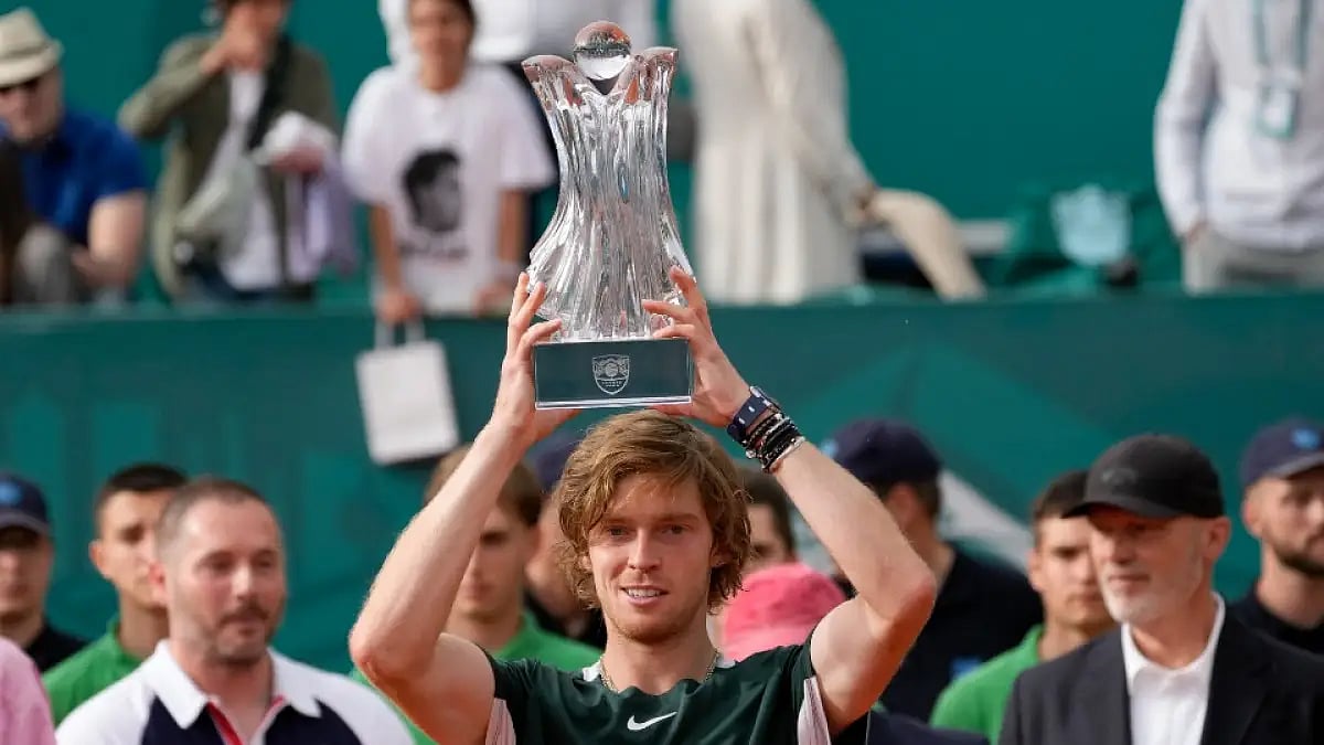 Andrey Rublev holds aloft the Serbia Open 2022 trophy after beating Novak Djokovic.  