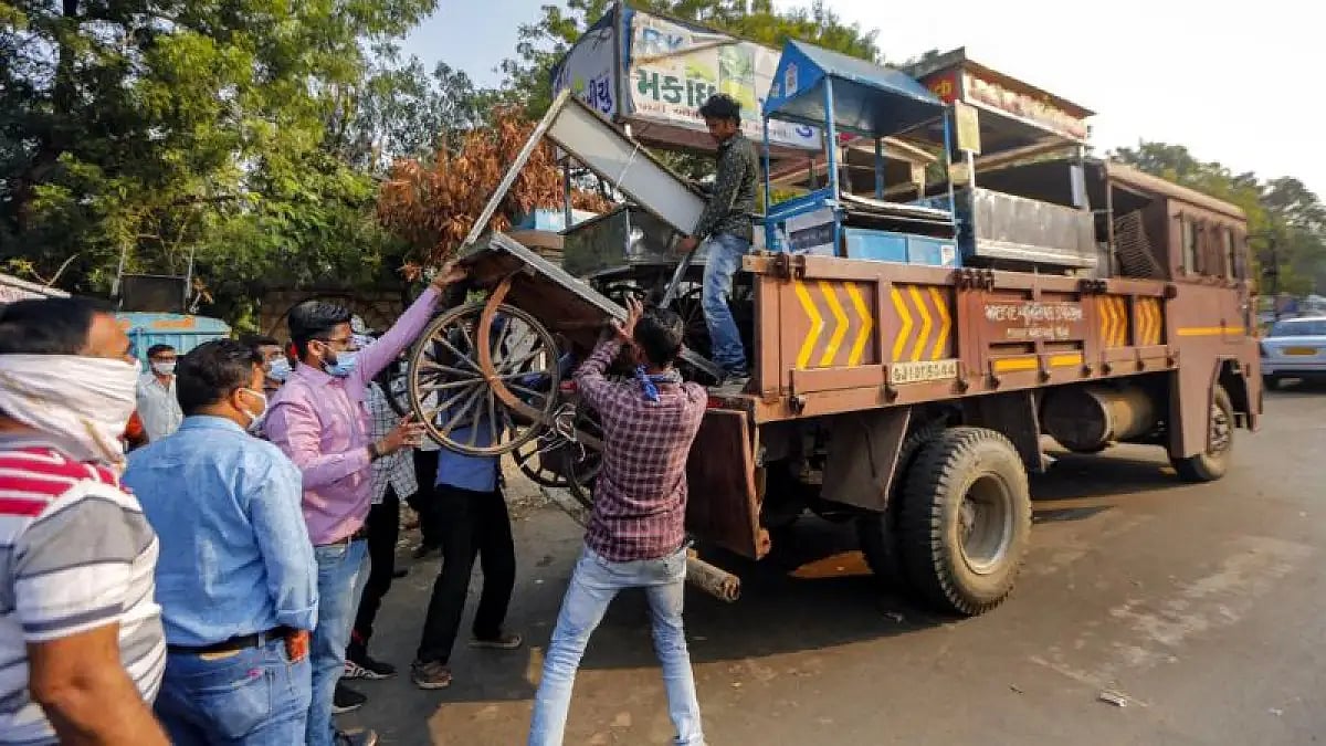 A cart being removed in eviction drive