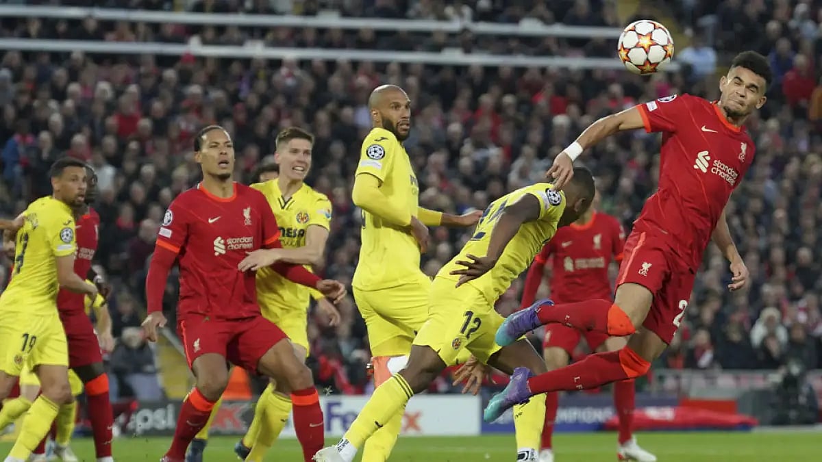 Liverpool's Luis Diaz, right, attempts a header during their UEFA Champions League semi-final, first leg match at Anfield.