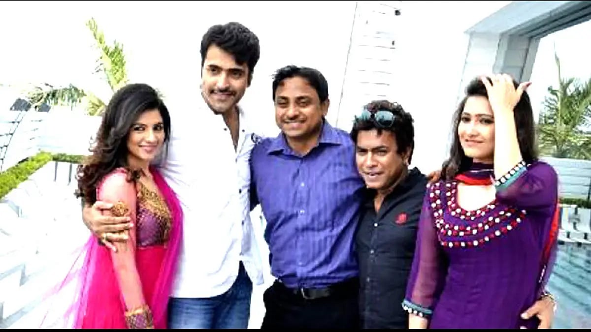 A Still From The Making Of 'Ashare Goppo'