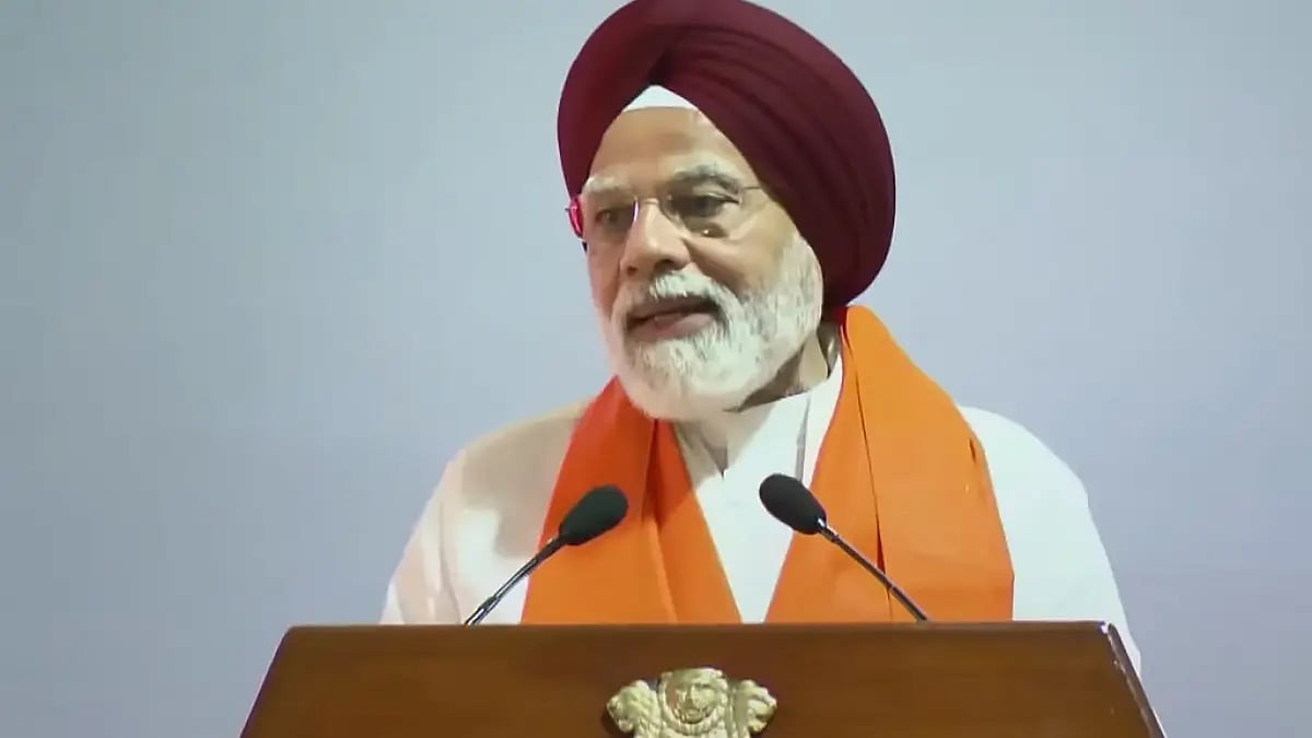 PM Narendra Modi interacts with a Sikh delegation, at his residence in New Delhi. 