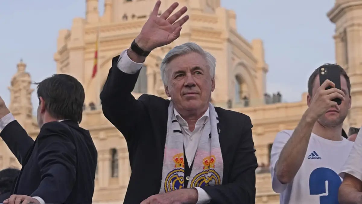 Head coach Carlo Ancelotti waves during celebrations after Real Madrid won the Spanish La Liga title
