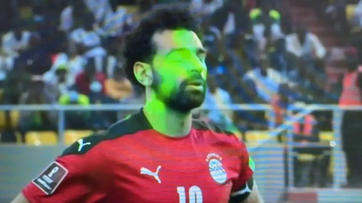 Laser lights pointed at Mohamed Salah's face during the Egypt vs Senegal FIFA World Cup playoffs.