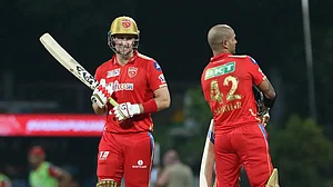 Liam Livingstone and Shikhar Dhawan after guiding Punjab Kings to an eight-wicket win against Gujarat Titans in IPL 2022.