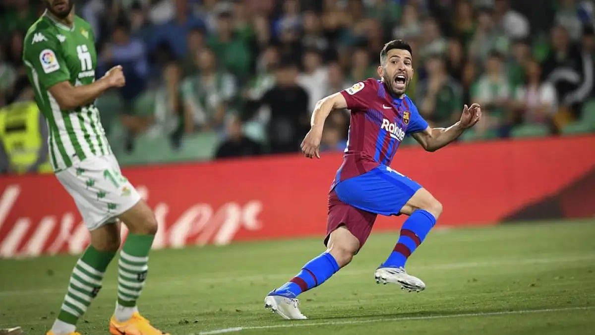 Barcelona's Jordi  Alba scores against Real Betis during their La Liga match, May 7, 2022. 