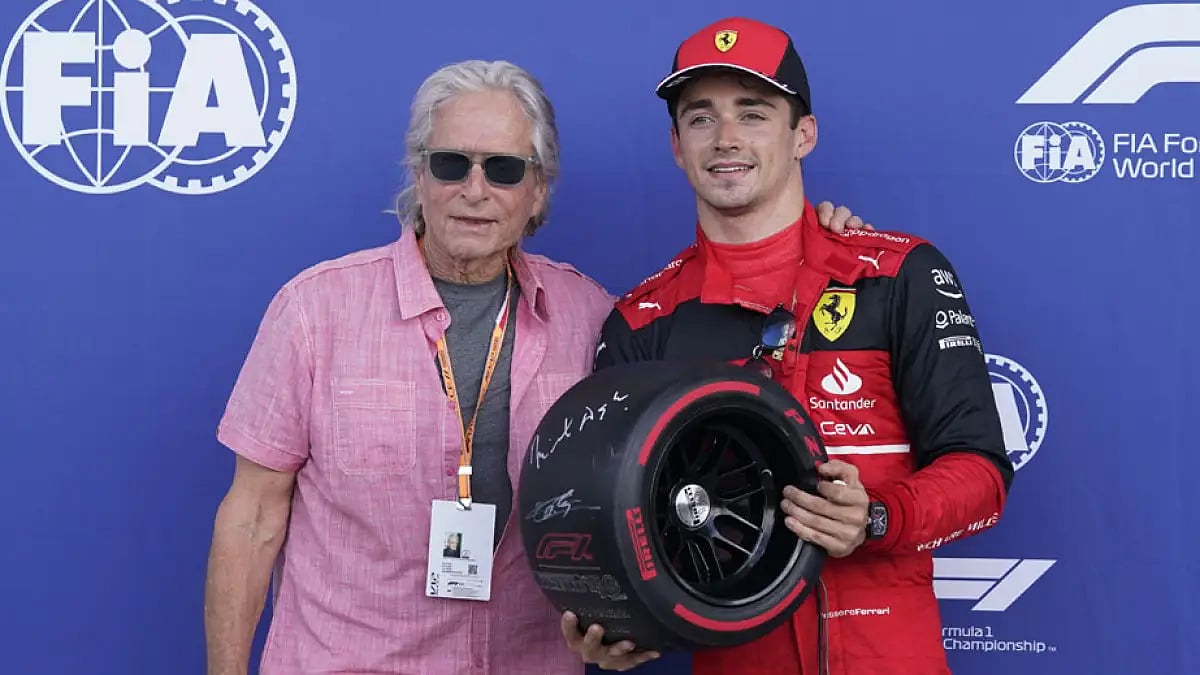 Charles Leclerc with Michael Douglas after winning the Miami Grand Prix pole position, May 7, 2022.