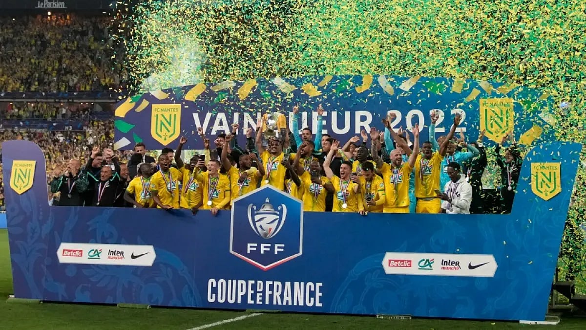 Nantes players celebrate after winning the French Cup 2021-22 beating Nice in final.