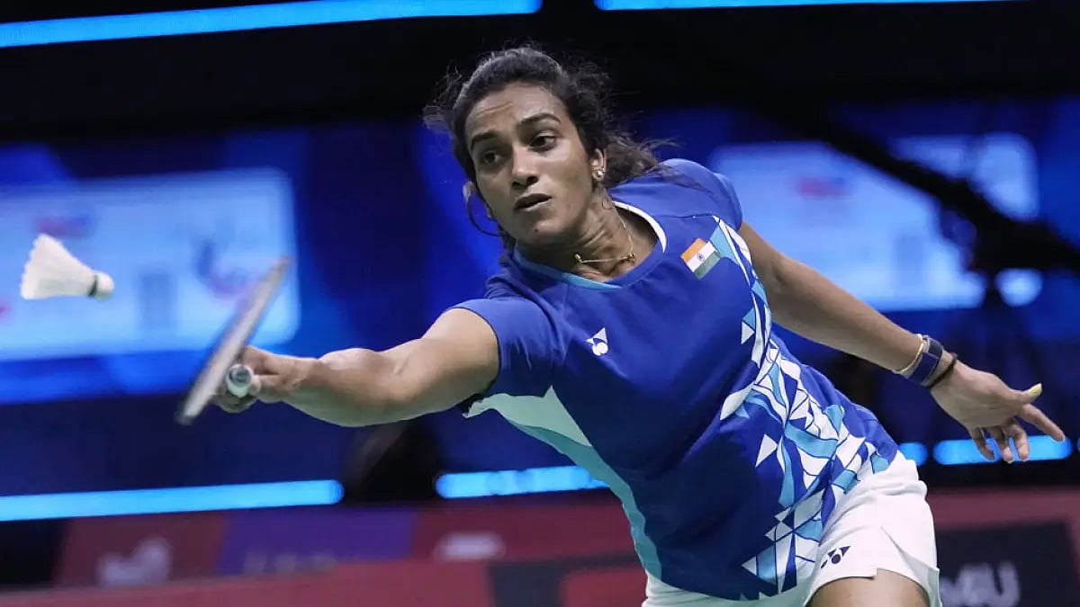 India's PV Sindhu returns a shot to South Korea's An Seyoung during their Thomas & Uber Cup match in Bangkok, May 11, 2022.