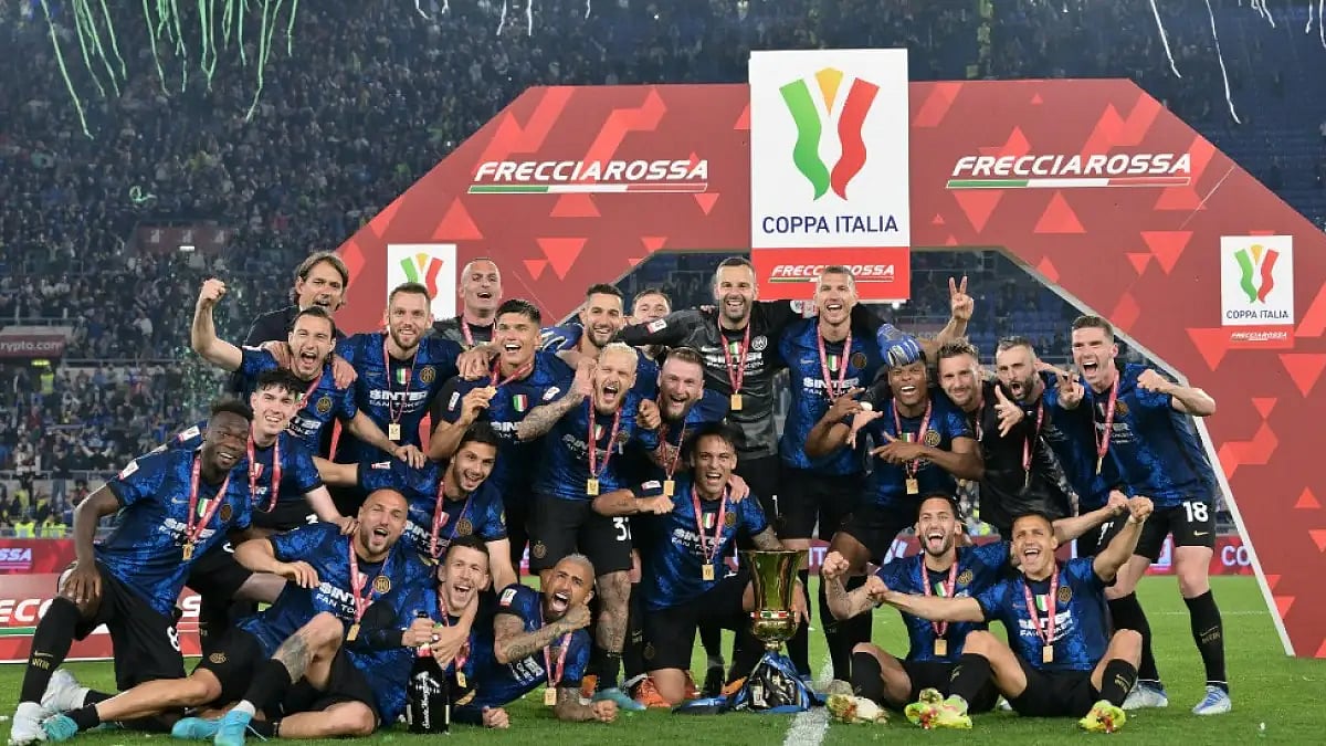 Inter Milan players celebrate their Italian Cup 2021-22 triumph over Juventus.  