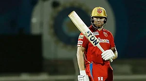 Punjab Kings opener Jonny Bairstow celebrates after his fifty against RCB in an IPL 2022 tie.