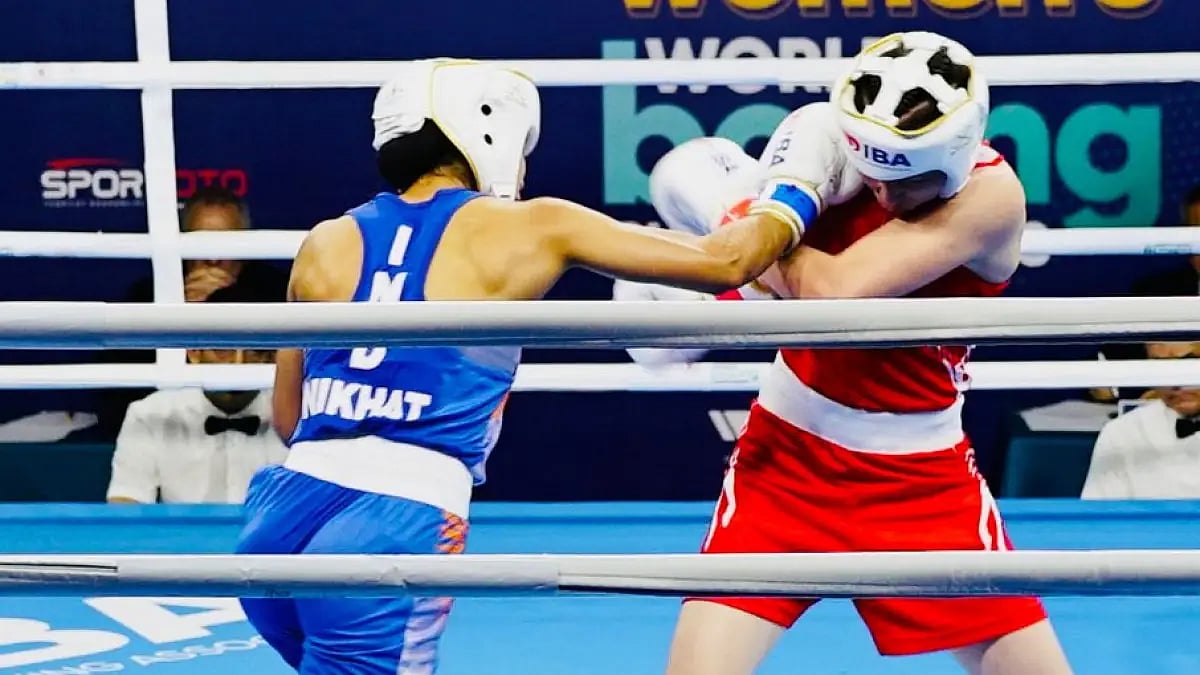India's Nikhat Zareen lands a punch on Mongolia's Lutsaikhan Altantsetseg.
