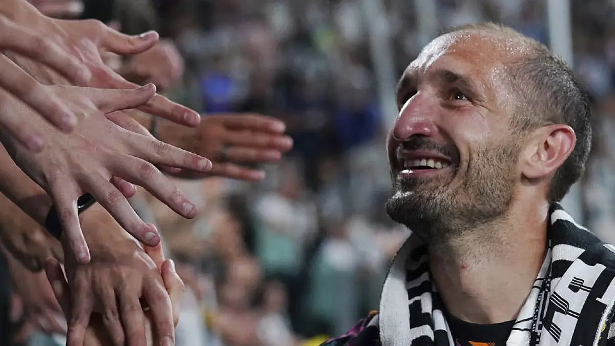 Giorgio Chiellini greeted by fans during Juventus vs Lazio, Serie A match at Allianz Stadium, Turin, May 16, 2022.