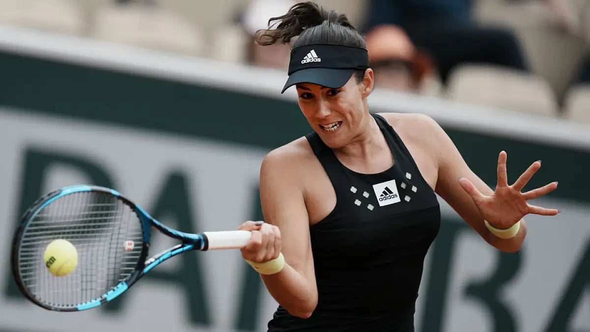Spain's Garbine Muguruza plays a shot against Estonia's Kaia Kanepi at the French Open, May 22, 2022.