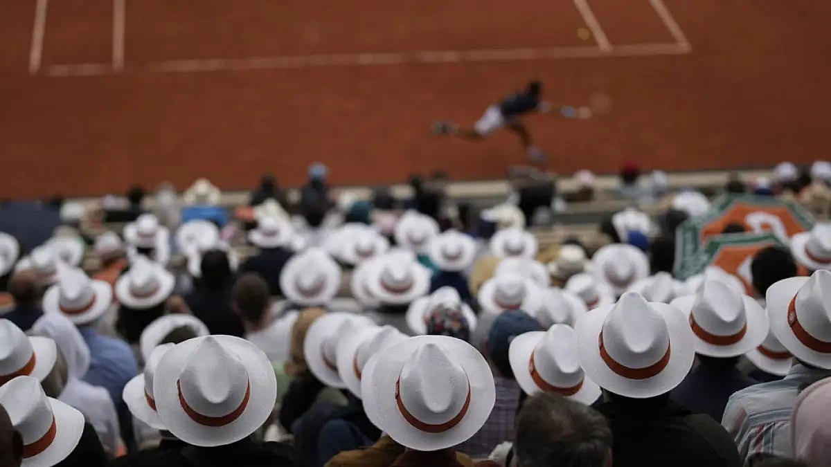 Spectators watch first-round matches at the French Open 2022 on May 22, 2022.