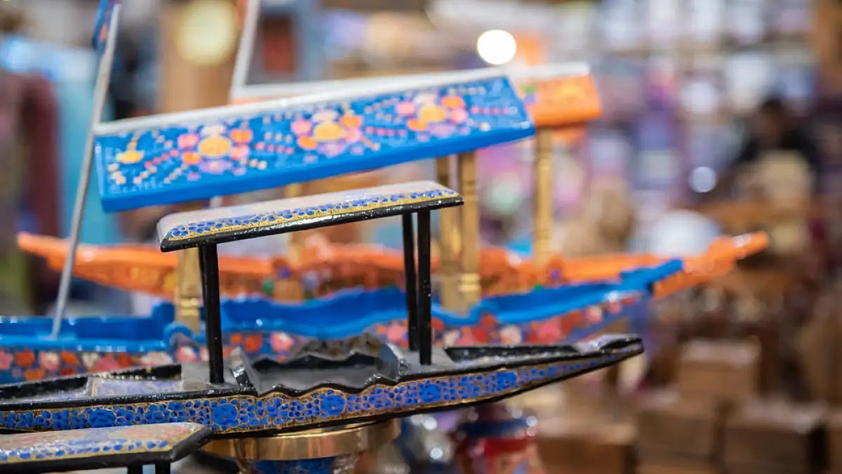 Handmade papier mache shikara boats