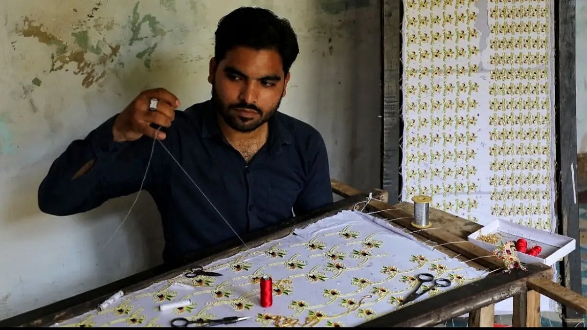 Artisan Barkat Ali from Vrindavan, Mathura, who makes clothes and accessories for Krishna and other 