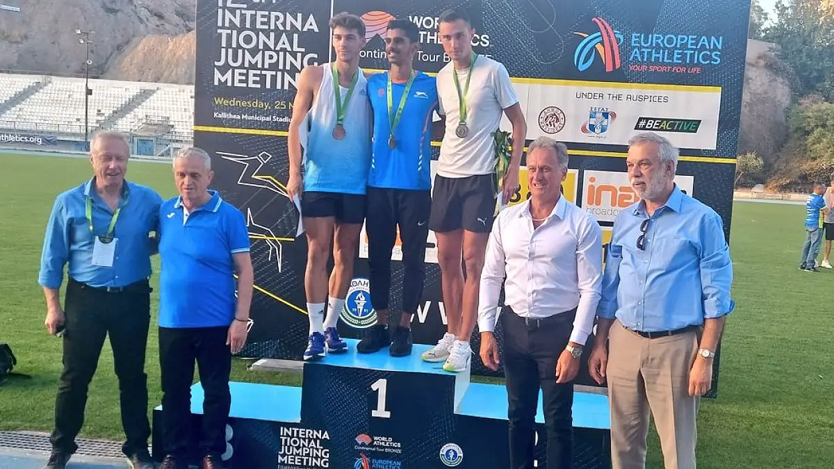 India's Murali Shreeshankar poses with other medal winners atop the podium in Greece.