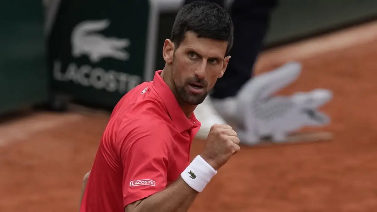 Novak Djokovic celebrates his win against Diego Schwartzman in their fourth round match at French Op