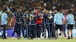 Gujarat Titans players celebrate after beating Rajasthan Royals in the IPL 2022 final.