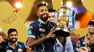Gujarat Titans skipper Hardik Pandya lifts the IPL 2022 trophy.