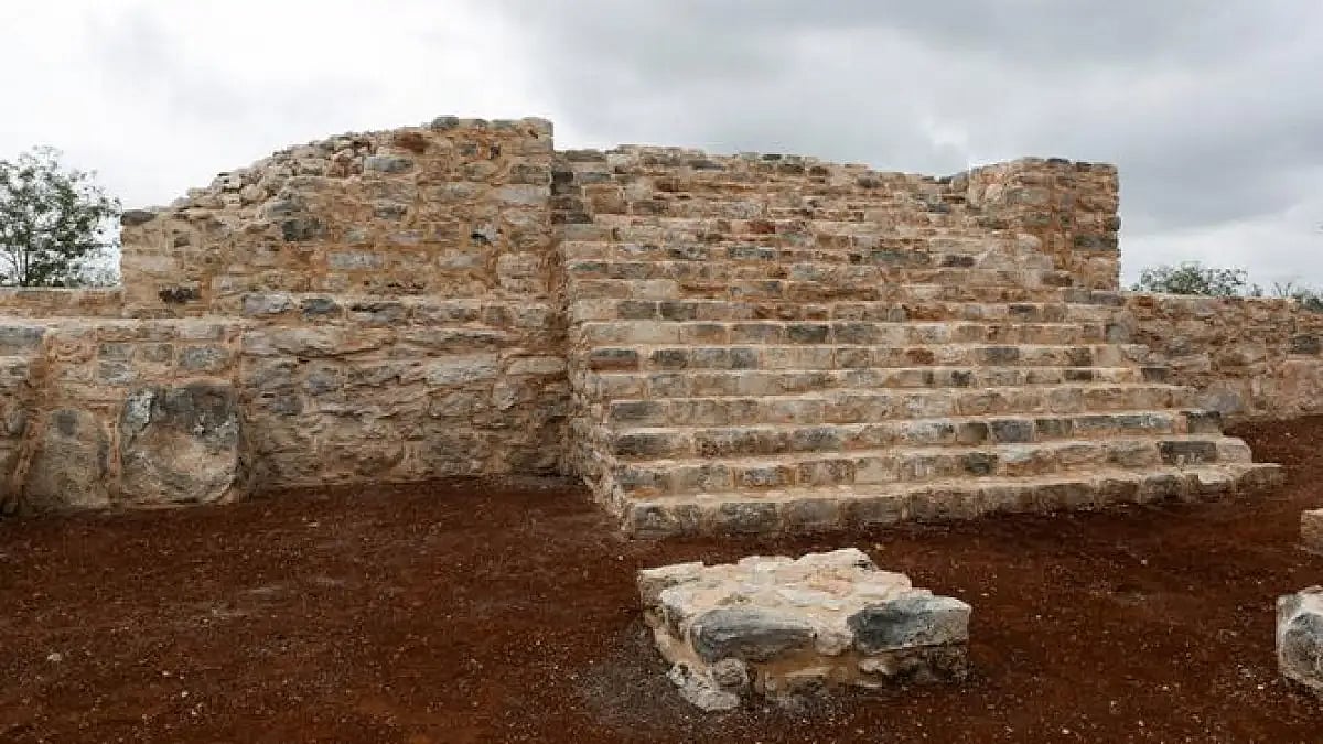 The site features the Mayan Puuc style of architecture, common in the southern Yucatan Peninsula