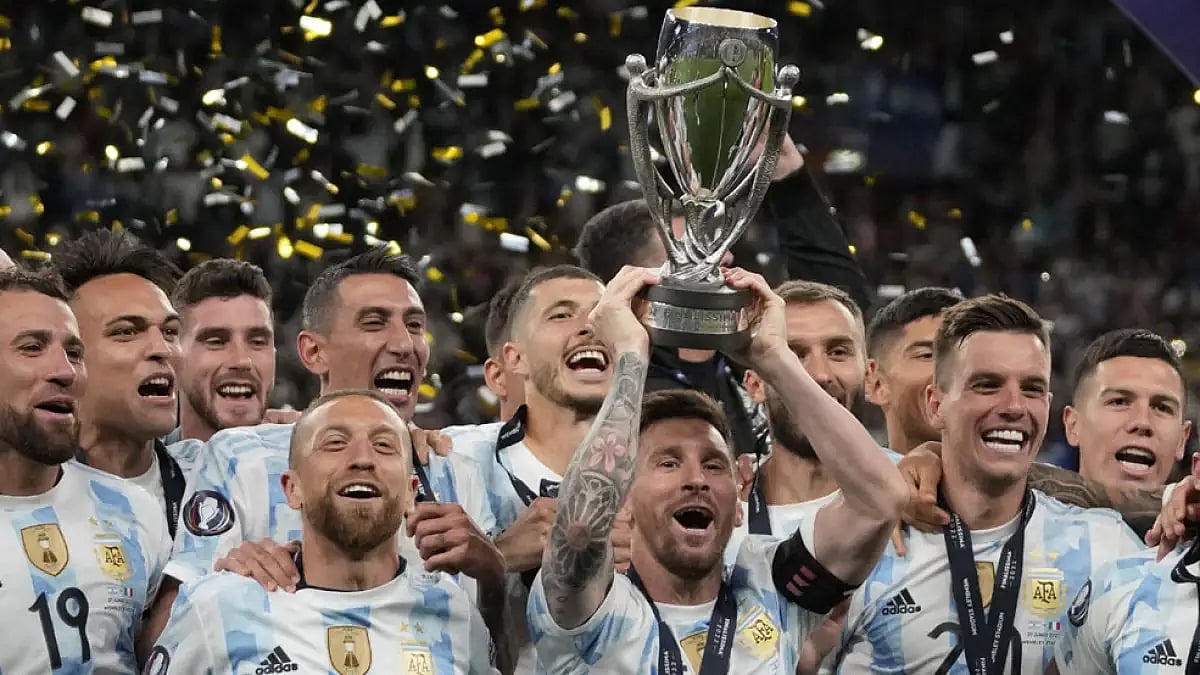 Argentina players celebrate with the Finalissima trophy after beating Italy at Wembley in London, June 1, 2022.