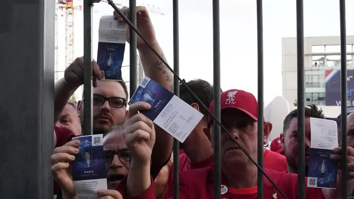 Fans shows tickets in front of the Stade de France prior the Champions League final between Liverpoo