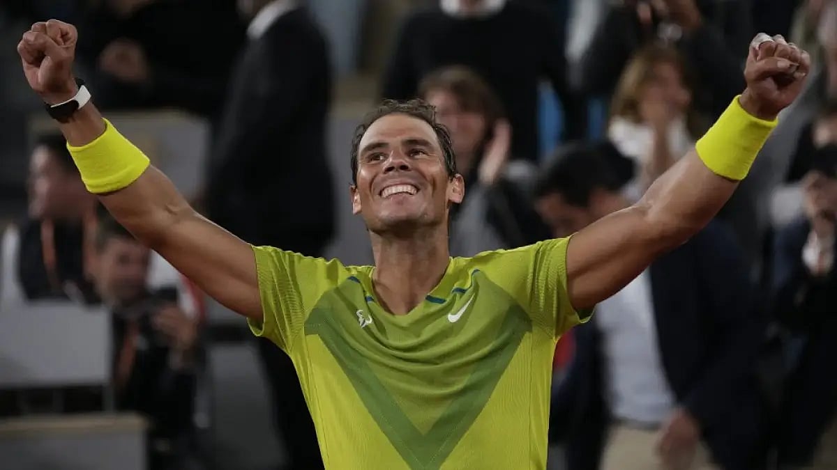 Rafael Nadal celebrates winning his quarterfinal match against Novak Djokovic at French Open 2022 on