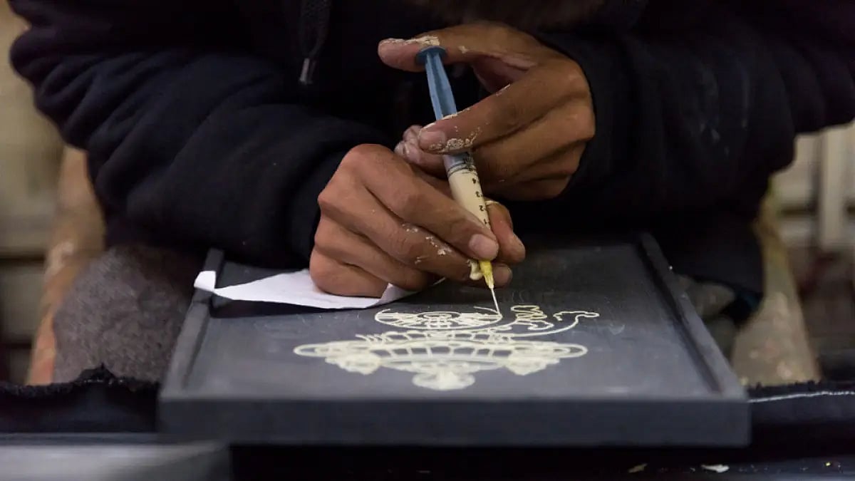 At Norbulingka, artists have revived a traditional Tibetan method of relief painting called kyumbur 