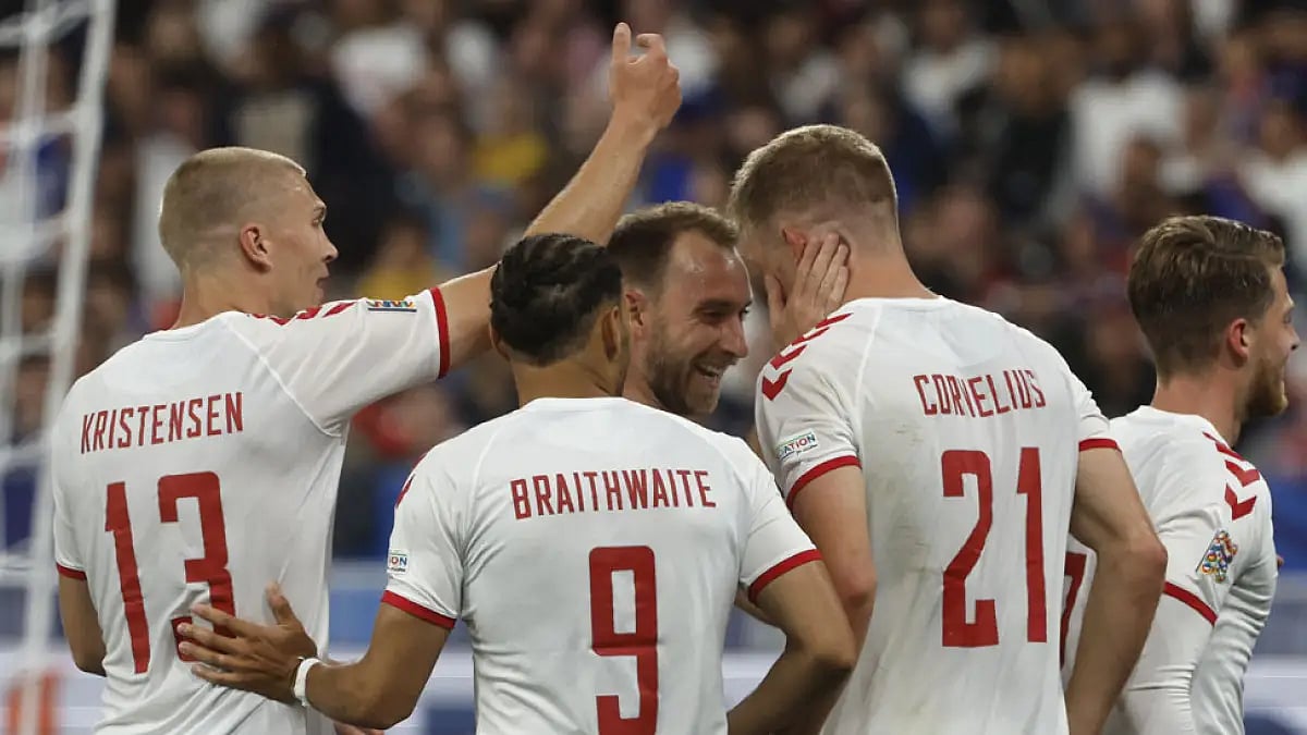 Denmark players celebrate Andreas Cornelius' goal against France, June 3, 2022.