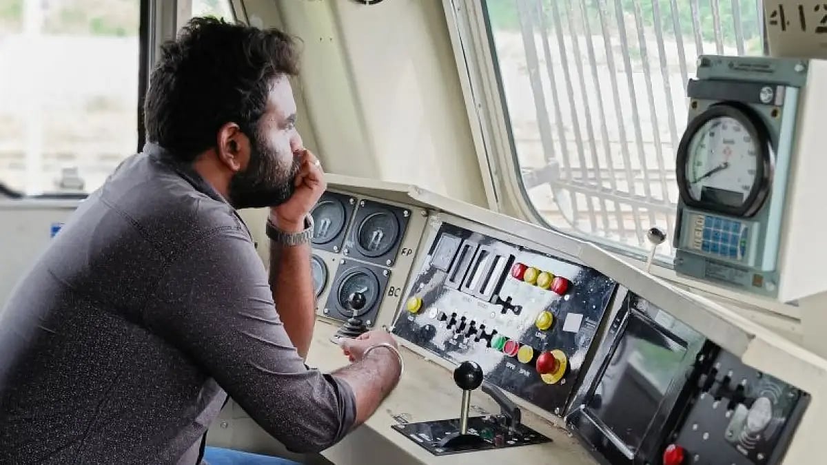Enoch Henry checks out a WAG 9H locomotive in Vishakhapatnam
