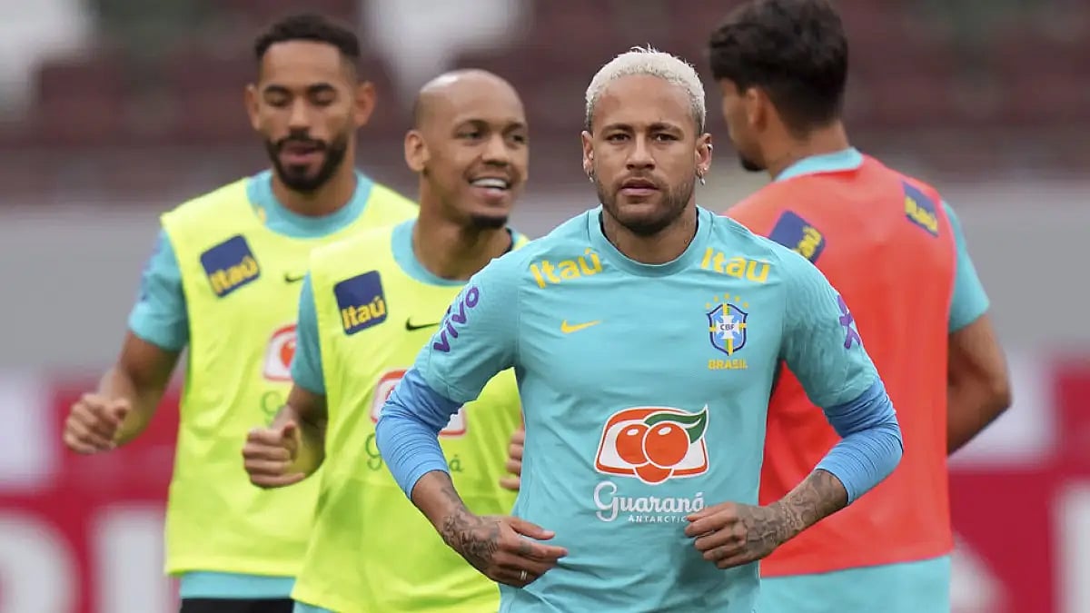 Neymar and his Brazil teammates warm up during a training session in Tokyo, June 5, 2022. Watch JPN vs BRA, football match live.