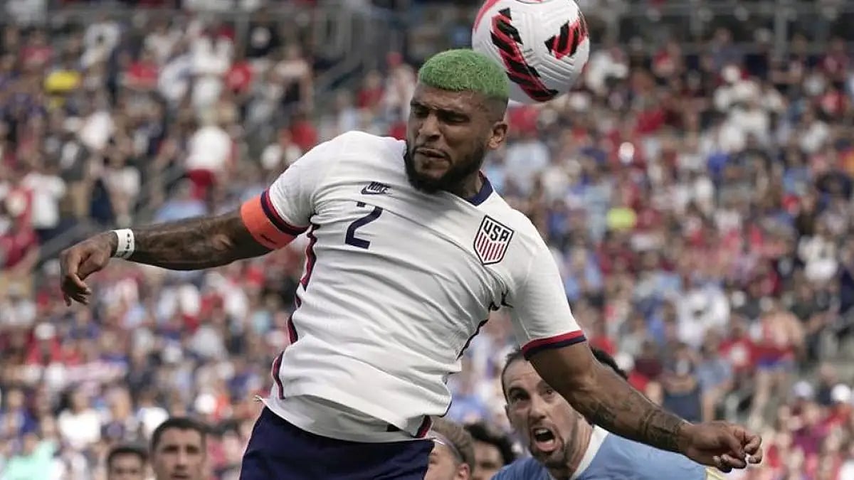 USA defender DeAndre Yedlin (centre) blocks a shot attempt during the international friendly match a