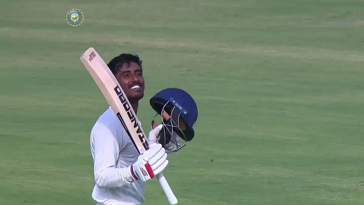 Bengal's Sudip Gharami celebrates after reaching his ton vs Jharkhand in Ranji Trophy. 