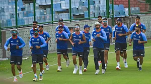 Indian players warm up ahead of their first T20 against South Africa in Delhi.