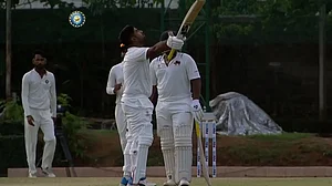 Mumbai's Suved Parkar celebrates his ton against Uttarakhand in Ranji Trophy 2021-22.