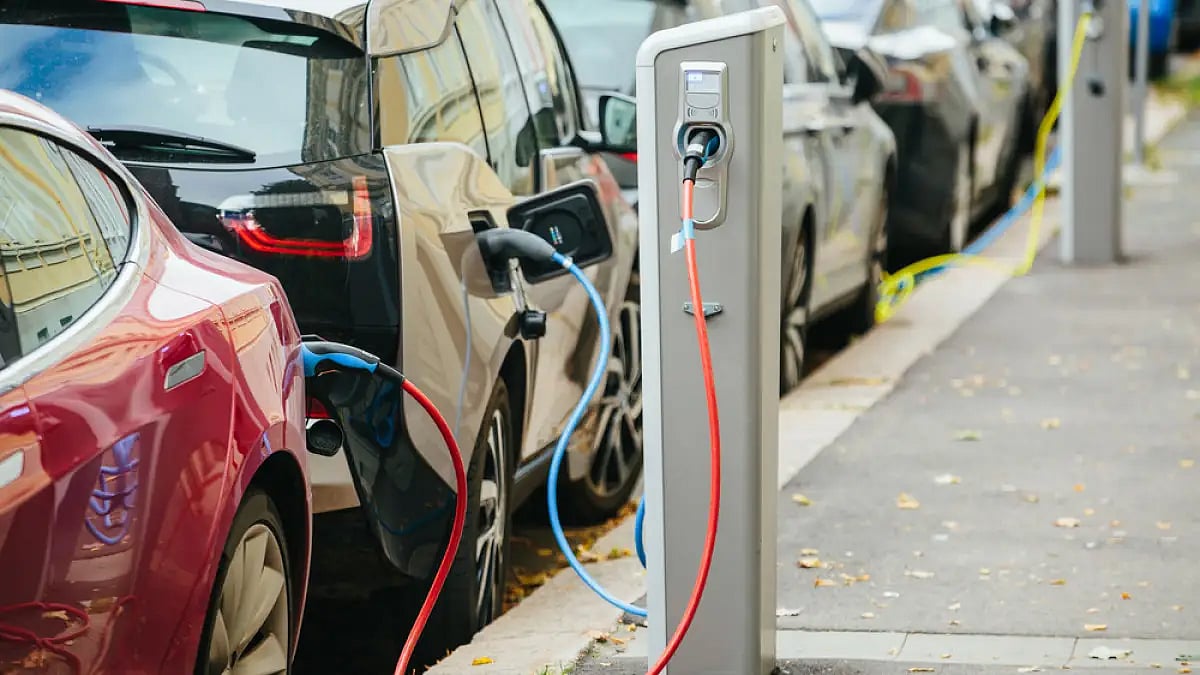 Electric vehicles rely on electricity to charge their batteries instead of using fossil fuels like p