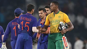 India and South Africa players shake hands after their second T20 game in Cuttack.
