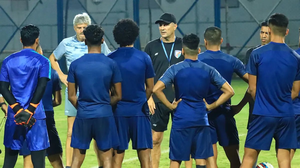 Head coach Igor Stimac (with the cap) addresses the Indian national football team members in Kolkata.