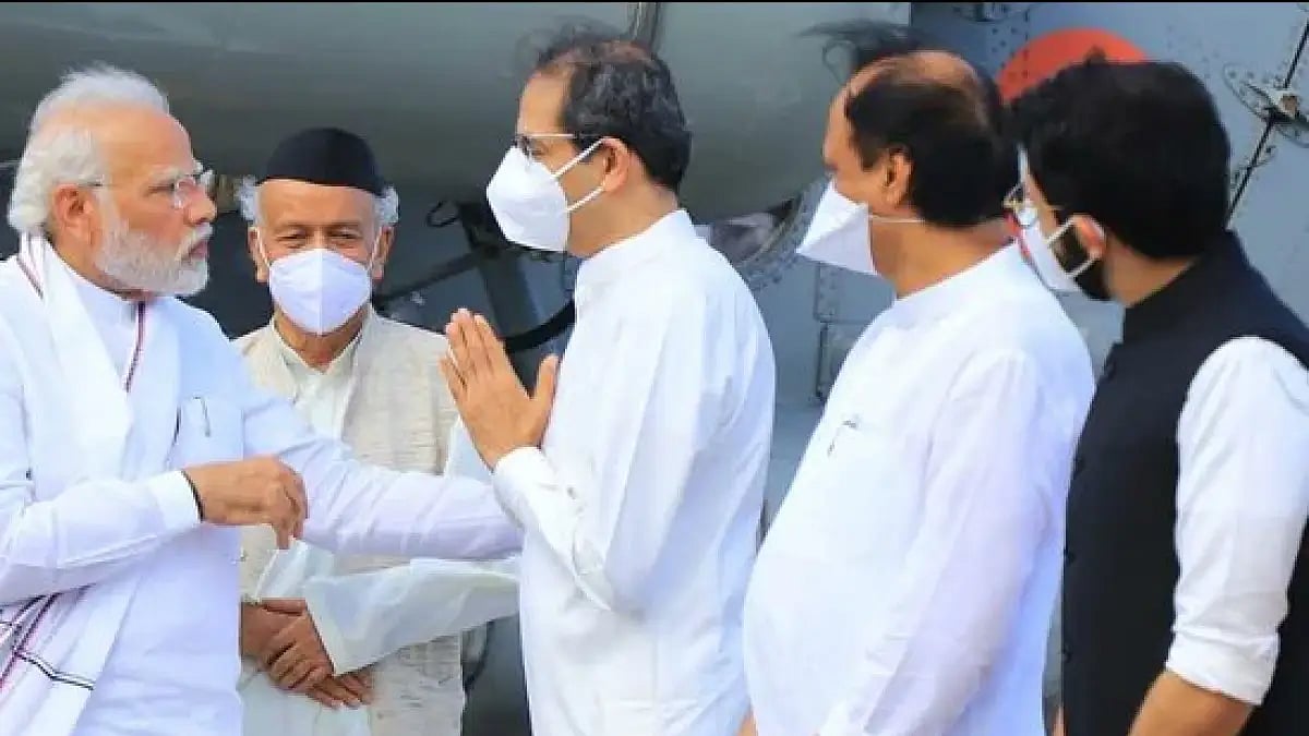 Maharashtra CM Uddhav Thackeray receives PM Narendra Modi in Mumbai.