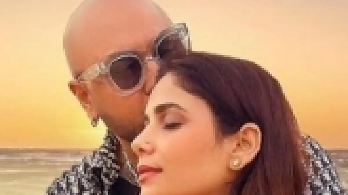 B Praak and wife Meera