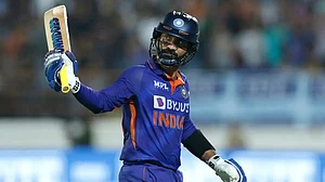 Dinesh Karthik celebrates his fifty against South Africa in Rajkot n fourth T20.