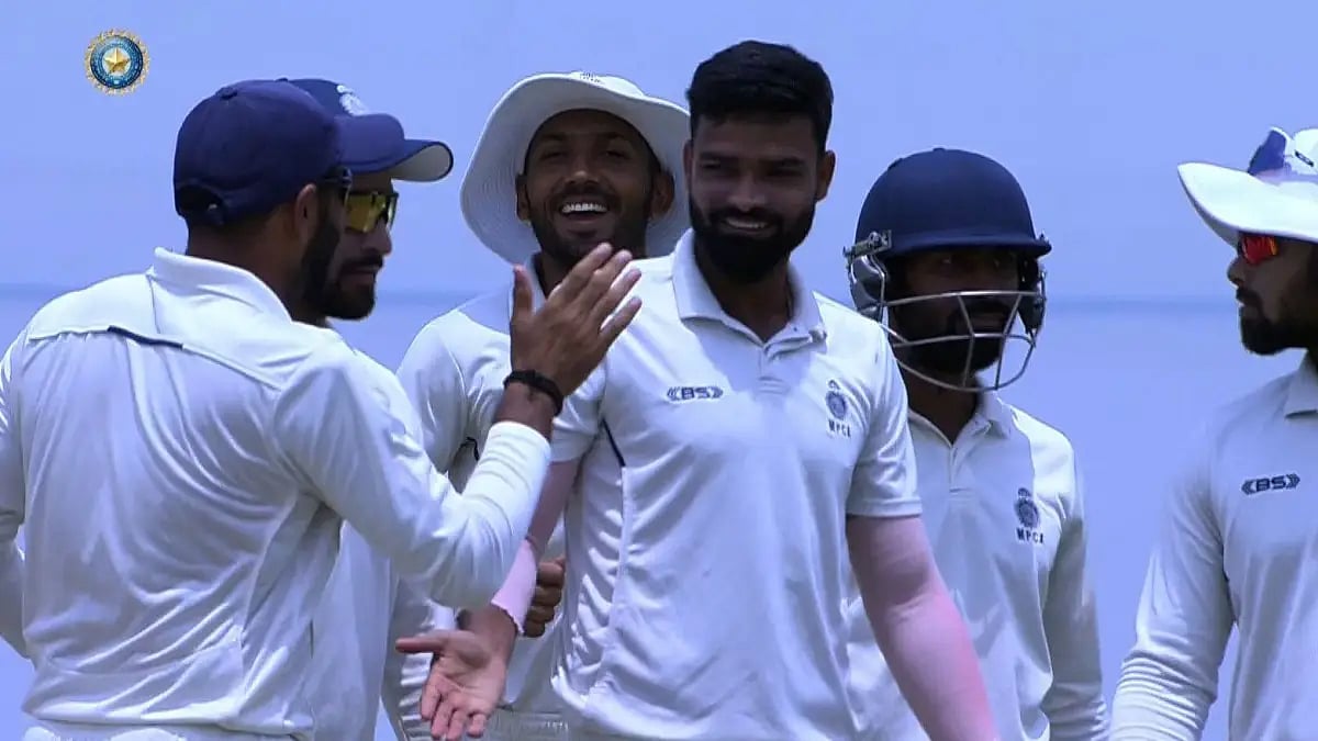 Kumar Kartikeya is congratulated by his Madhya Pradesh teammates after taking a Bengal wicket. Kumar