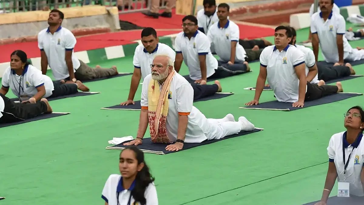 PM Narendra Modi participates in a mass yoga session to celebrate the 8th International Day of Yoga,