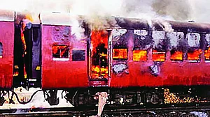 Godhra, 2002 The burning Sabarmati Express that precipitated the Gujarat riots
