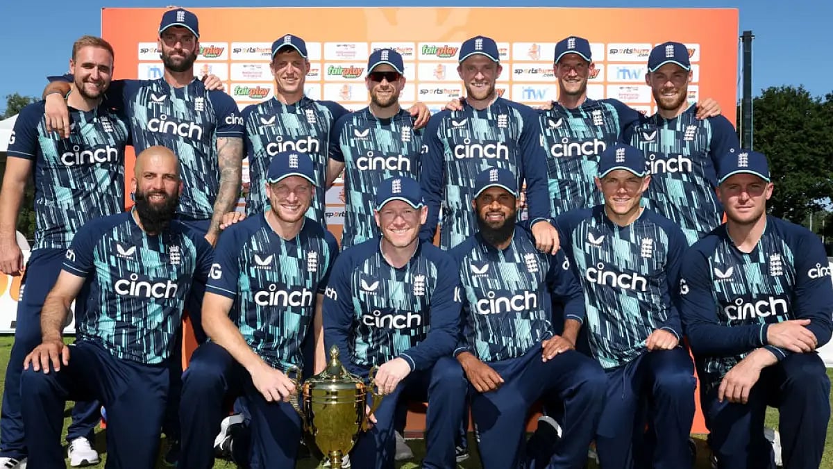 England cricketers pose with the trophy after beating the Netherlands in Amstelveen on June 23, 2022.