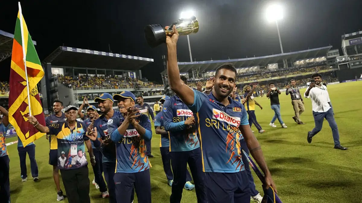 Sri Lanka cricketers celebrate their victory over Australia in the ODI series in Colombo, June 24, 2022.