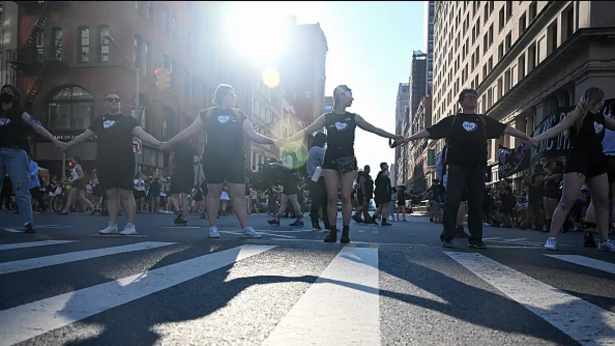 People participate in the 30th Annual New York City Dyke March on June 25, 2022 in New York City. 
