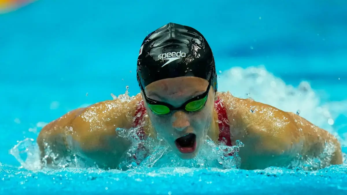 Summer McIntosh from Canada competes during her women's 400m individual medley heat.