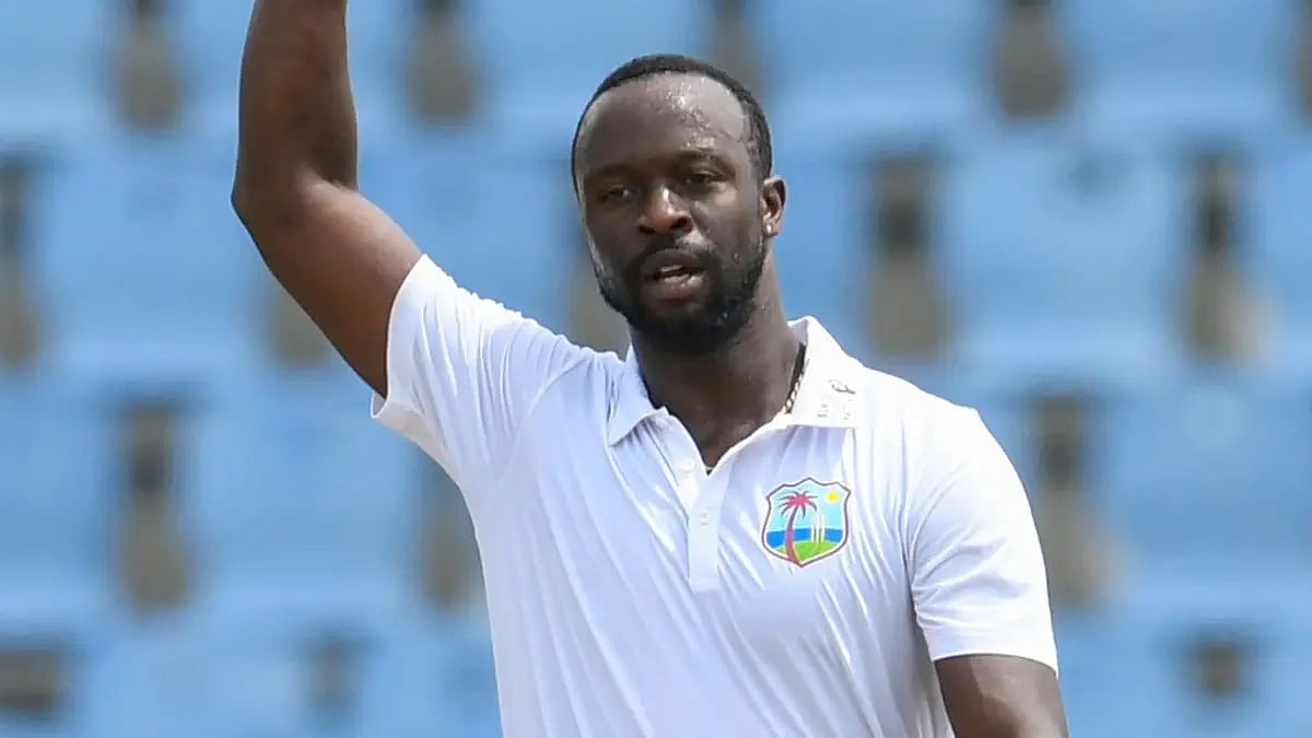 Kemar Roach celebrates after taking his 250th Test wicket for West Indies on Sunday. 
